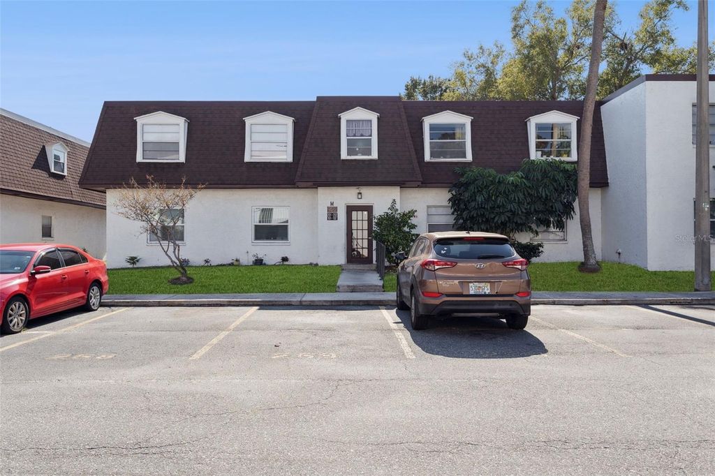 Photo of 9122 Tudor Drive #M102, Tampa, FL 33615 (MLS # O6361511)