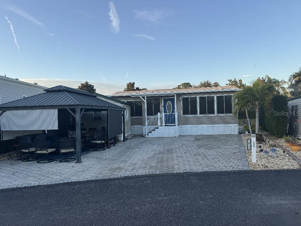 Photo of 16736 Sunshine Avenue, Clermont, FL 34714 (MLS # TB8548588)