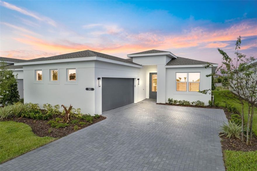 Cresswind at Hammock Oaks, a new active 55+ community by Kolter Homes, is situated in Lady Lake, FL, famously known as the “home of lakes and sunshine.” Located near The Villages the community is only minutes from Leesburg and convenient to Orlando. This gated community in Central Florida features Cresswind's national award-winning "Set Yourself FREE" lifestyle program based on the cornerstones of Fitness, Relationships, Education and Entertainment. The resident-only clubhouse with a state-of-the-art fitness center and offers 55+ neighbors a place to gather and participate in social activities facilitated by a full-time Lifestyle Director. Outdoor amenities will include pickleball & tennis courts, walking trails, resort-style pool and spa, pool, event and entertainment areas.   Experience elevated living in The Laura, an exceptional new construction home in the coveted Cooper Collection. Designed with today’s discerning buyer in mind, this move-in ready residence showcases timeless architectural design and modern luxury in every detail. Featuring 3 spacious bedrooms and 3 beautifully appointed, spa-inspired bathrooms, The Laura provides over 2,100 square feet of meticulously planned living space—ideal for families, professionals, and anyone seeking comfort and style.
The centerpiece of the home is the gourmet kitchen, crafted for both functionality and elegance. Enjoy preparing meals with premium stainless steel appliances, including a wall oven, gas cooktop, and an efficient chimney-style exhaust hood. Frameless European-style cabinetry with upgraded large crown molding offers abundant storage and a contemporary look, while the 24” deep cabinet above the refrigerator with a side panel provides extra convenience. The kitchen is adorned with stunning 3cm luxury veined quartz countertops and an artisan tile backsplash, perfect for both daily living and entertaining guests.
The Owner’s Suite is a true retreat, featuring a luxurious extended shower with a frameless glass enclosure, upgraded stone mosaic tile flooring, and both a standard and handheld showerhead with a slide bar. All bathrooms include upgraded plumbing fixtures and tile that extends to the ceiling, providing a spa-like atmosphere. The home’s main living areas are finished with elegant 12x24 porcelain tile, while the Owner’s Suite and flex space feature stylish laminate plank wood flooring for warmth and durability.
Additional features include 16’ sliding glass doors leading to a tranquil covered lanai—ideal for year-round outdoor enjoyment—as well as sophisticated matte black designer hardware on all interior doors.