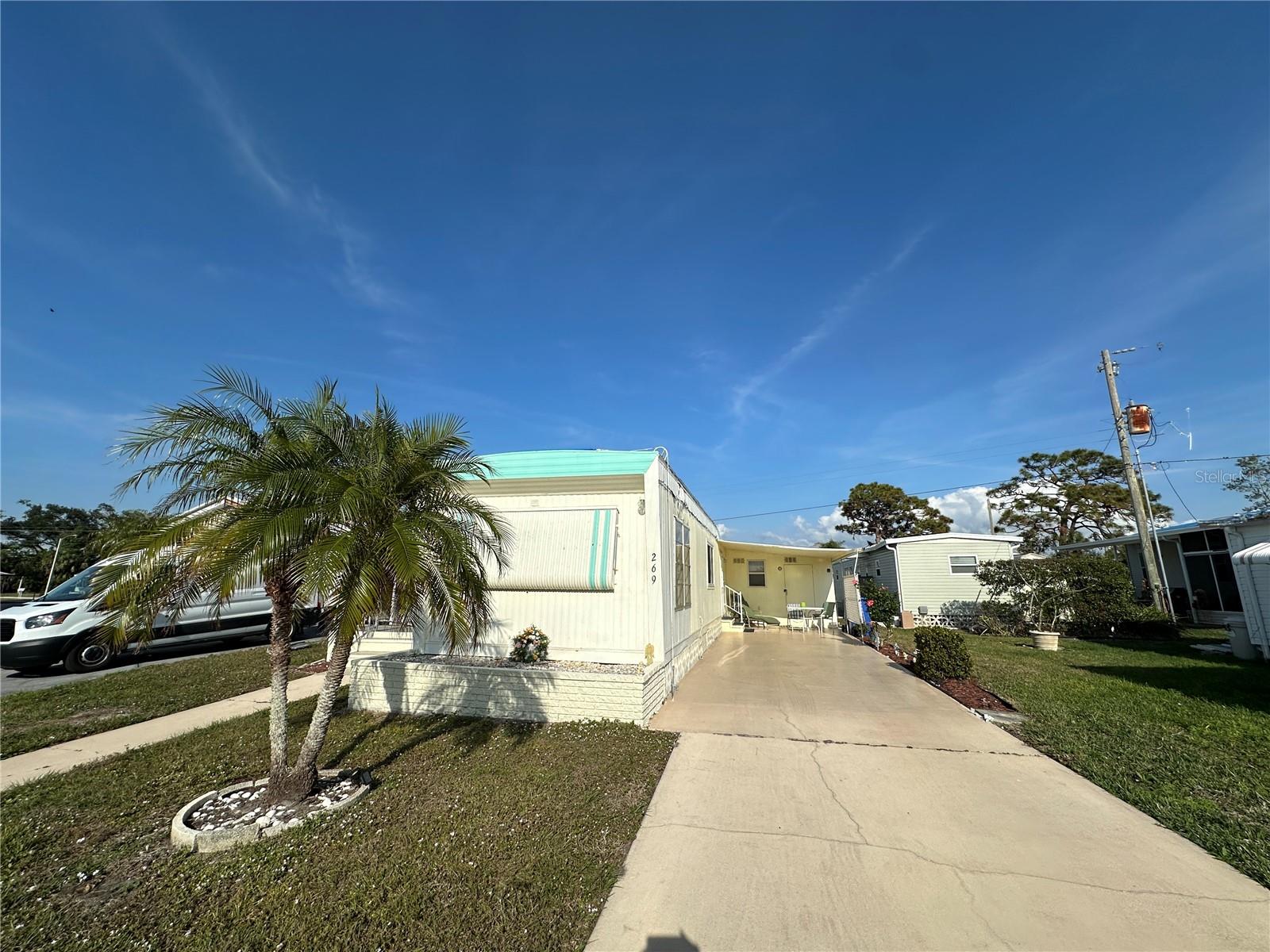 Price reduced!1 bedroom 1-bathroom mobile home with new plumbing, remodeled kitchen and bathroom that has a marble sink in 2019. It is located in a popular Colonial Manor, within the City of Venice. Minutes’ drive to downtown & the Venice beach. Residents own a share of land. The roof is covered by a blue tap, partial roof, carport & lanai were damaged by Hurricane Milton. Laminated floor throughout the whole house for easy care. New sliding window in the kitchen, new entrance door & new meter box in 2024. Laundry tub, washer and dryer in the shed. Affordable HOA fees include water, sewer, trash and clubhouse, swimming pool, ground maintenance & many others.