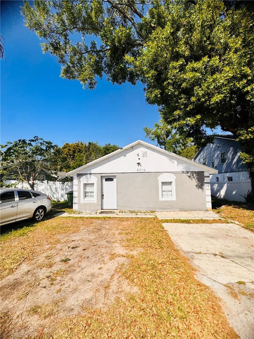 Photo of 8710 N Tangerine Place, Tampa, FL 33617 (MLS # TB8506529)