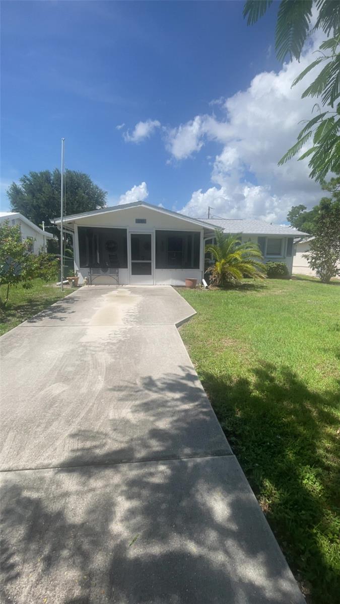 Welcome to this spacious 2-bedroom, 2-bathroom home located in the heart of Englewood, FL. This property boasts an open concept design, offering a seamless flow between living spaces. Whether you prefer it fully furnished for a turnkey experience or unfurnished to make it your own, this home is ready to accommodate your needs. The home is situated in a prime location, just a short distance from a variety of shopping and dining options. For beach lovers, the beautiful blue water beaches and Dearborn Street are just a short drive away. The home is also conveniently located close to major roadways, making commuting a breeze. Pet lovers will appreciate the pet-friendly policy (with an additional fee). The house features a bonus room/sitting room off the back, perfect for relaxation or entertainment. The large front and backyard offers ample space for outdoor activities, and an outdoor shed provides additional storage. This home is a perfect blend of comfort, convenience, and style. $35 monthly Resident Benefits Package fee will be added to the rent.