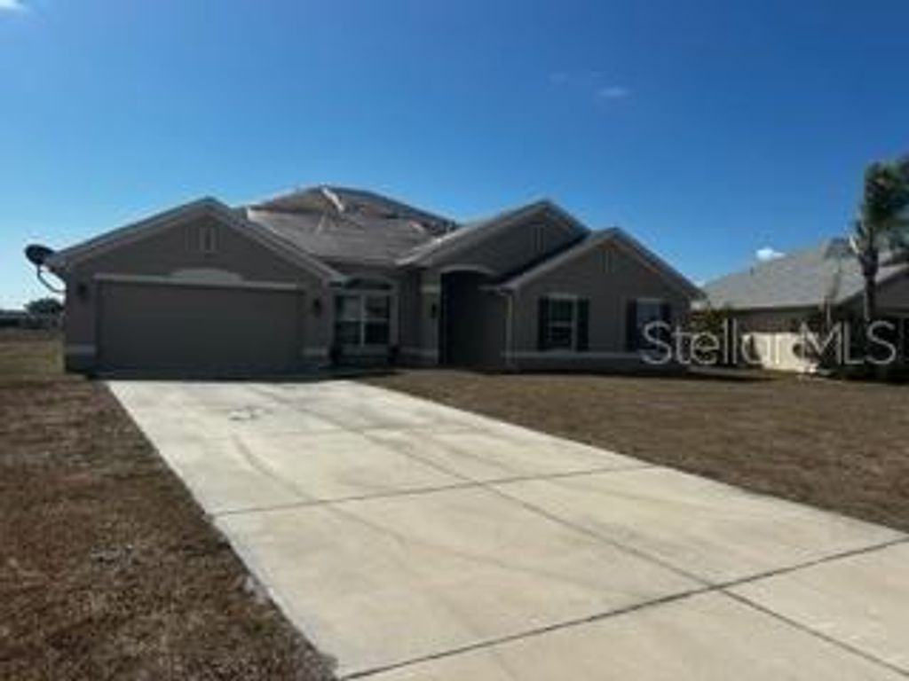 Photo of 26357 Trinilas Drive, Punta Gorda, FL 33983 (MLS # A4677872)