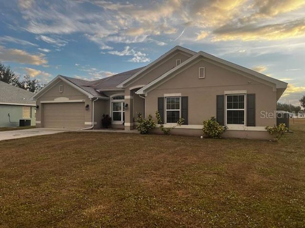 Photo of 26357 Trinilas Drive, Punta Gorda, FL 33983 (MLS # A4677872)