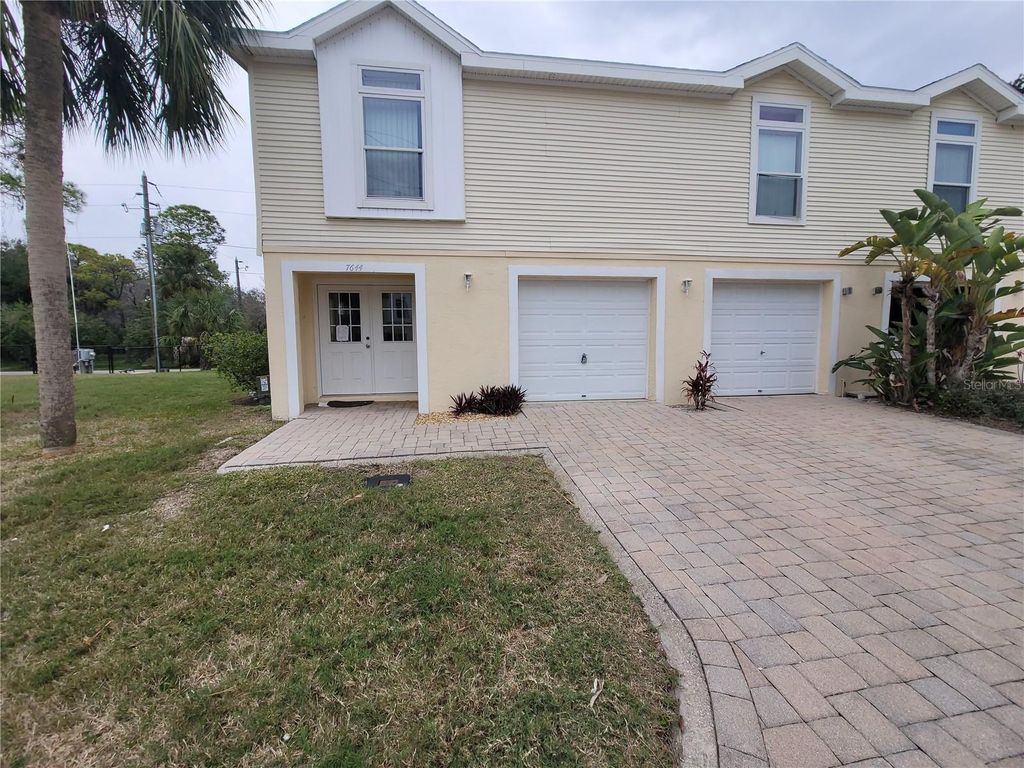 Photo of 7644 Sailwinds Pass, Port Richey, FL 34668 (MLS # W7880971)