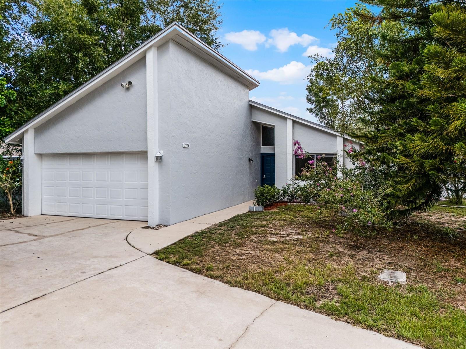 Tucked away at the end of a peaceful cul-de-sac in Orlando’s Cinnamon Bay community, 7114 Marvista Court delivers the perfect mix of comfort, style, and convenience. The oversized lot and fresh curb appeal invite you in, setting the stage for a home that’s been tastefully refreshed and move-in ready. Inside, vaulted ceilings and abundant natural light create a bright, open feel. Fresh paint, trim, and a mix of tile and laminate flooring give the space an easy maintenance, crisp, modern look that complements any décor. At the heart of the home, the kitchen boasts stainless steel appliances, gleaming granite countertops, and cabinetry that blends style with everyday functionality. The layout flows easily into the dining and living areas, making it perfect for entertaining or enjoying quiet evenings at home. The split-bedroom floor plan offers privacy, with the spacious primary suite featuring a walk-in closet and private bath on one side, and two additional bedrooms with a full bath on the other. Sliding glass doors lead to an inviting screened porch—an ideal spot for morning coffee, evening cocktails, or simply relaxing while overlooking the fenced backyard. Mature fruit trees add shade and charm, while the ample yard space offers possibilities for gardening, play, or gatherings with friends and family.An attached two-car garage adds storage and convenience, and the end-of-street setting ensures minimal traffic and extra privacy. The location puts you minutes from shopping, dining, and major highways, with easy access to OIA, Millenia, and the attractions. Zoned for Olympia High, the home also benefits from a modest HOA fee that keeps the neighborhood looking its best without the burden of high dues. 7114 Marvista Court is more than just a house—it’s a comfortable, well-maintained home with thoughtful updates, a functional layout, and a backyard made for enjoying the Florida lifestyle. Call today to set up your private showing.