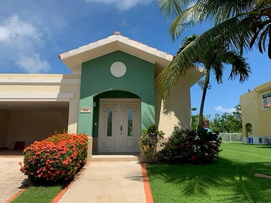 Welcome to this beautifully remodeled ground-floor home in the Plantation community of Palmas Del Mar. Designed for both comfort and style, this single-level residence features 3 spacious bedrooms, 2.5 modern bathrooms, and an enclosed garage for secure parking. The open-concept living and dining area is bright and airy, perfect for entertaining or enjoying quiet evenings at home. The fully remodeled kitchen boasts high-end appliances, sleek cabinetry, and ample counter space, making it a dream for any chef. The master suite offers a serene retreat with a luxurious en-suite bathroom and generous closet space. Additionally, the property is equipped with a powerful 20K diesel generator, ensuring uninterrupted comfort during power outages.

Fully furnished and move-in ready, this home is ideal for long-term rental and offers access to exclusive community amenities, including a resort-style pool, a fully equipped gym, and a park. Situated in the heart of Palmas Del Mar, residents can enjoy the convenience of nearby beaches, restaurants, golf courses, and a vibrant community atmosphere.
