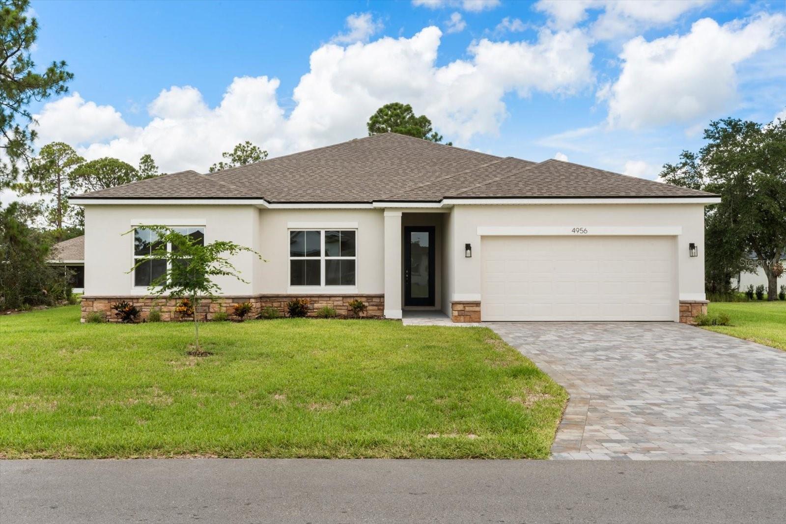 Under Construction. Brand New, Upgraded 4-Bedroom Home in Sugarmill Woods Cypress Village.
Welcome to this brand new, beautifully built home in the highly sought-after Sugarmill Woods! Featuring 4 spacious bedrooms, 3 full bathrooms, and a 2-car garage, this home offers modern living at its finest, with high-end upgrades and thoughtful design throughout.
Step inside to a bright, open-concept layout with spacious ceilings, luxury vinyl plank flooring, and designer finishes. The chef-inspired kitchen boasts quartz countertops, stainless steel appliances, custom cabinetry, and a large center island—perfect for entertaining and everyday living. The owner’s suite is a true retreat with a spa-like en-suite bath, complete with dual vanities, a walk-in shower, and a spacious dual walk-in closets. Three additional bedrooms and two full guest bathrooms provide plenty of room for family, visitors, or a home office. Enjoy the convenience of a 2-car garage, modern fixtures, energy-efficient features, and plenty of storage. Outside, a covered patio invites you to relax and enjoy the Florida lifestyle. Located in the vibrant Sugarmill Woods community, you’ll have access to top-rated golf courses, parks, walking trails, and more. This turnkey new construction is already under construction—don’t miss your chance to
make it yours!