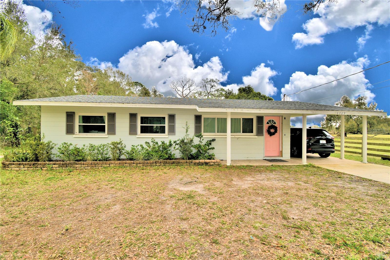 Are you looking for a place in the country to have animals and do a little gardening? If so then don't miss out on this cozy single family home in the country! This home is on a beautiful stretch of land bordered by cow pastures and a creek yet the home is only minutes from shopping and many other amenities in north Lakeland. This home has recently gone through an almost total remodel with tons of upgrades. Seeing is believing with this quaint and well cared for home!