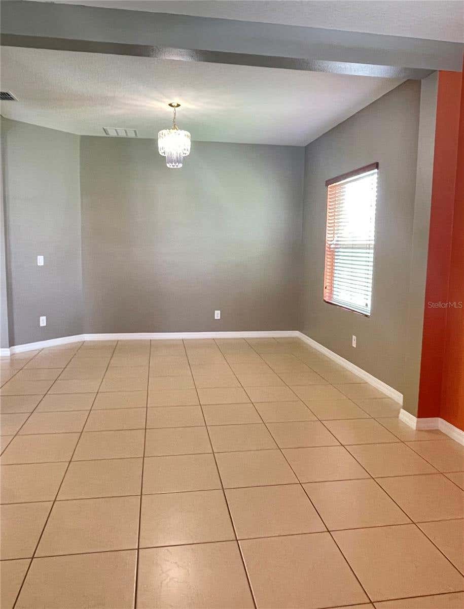 Photo of 12810 Boggy View Dr, Orlando, FL 32824 (MLS # O6430056)