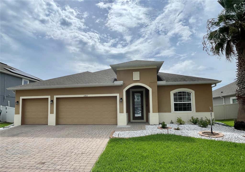 Photo of 12810 Boggy View Dr, Orlando, FL 32824 (MLS # O6430056)