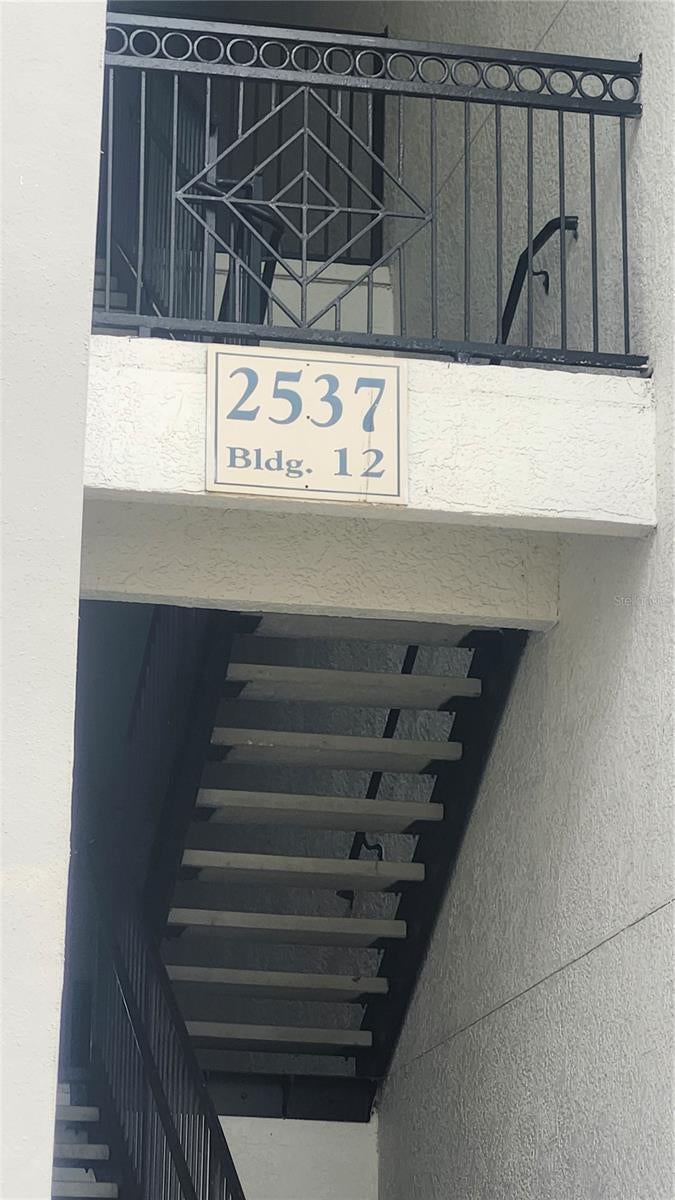 Photo of 2537 Maitland Crossing Way #107, Orlando, FL 32810 (MLS # V4951458)