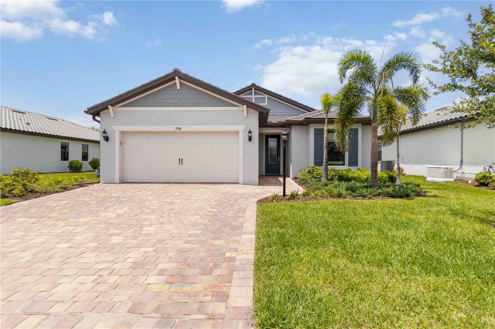 Immaculate Pulte Mystique with Exceptional Upgrades on Premier Water Lot in Del Webb
Lakewood Ranch. This stunning 3-bedroom plus flex room/den, 2-bath Mystique by Pulte is the
epitome of refined Florida living perfectly situated in the sought-after, active adult community
of Del Webb Lakewood Ranch.
The open-concept layout is enhanced by tile floors throughout. Additional upgrades include
tray ceilings, crown molding, surround sound speakers, Hunter Douglas window treatments, 8’
doors and 5” baseboards. Included is a whole house water filtration and softener system.
The stunning Great Room with a Tray Ceiling has a Zero-Corner Pocketing Sliding Doors,
opening to an expansive lanai with a tranquil Lake View. The lanai is perfect for dining,
entertaining or just relaxing. Pre-plumbed for your dream outdoor kitchen with hook up for tv
on the wall of the lanai.
The crisp white gourmet kitchen features quartz countertops, upgraded stainless appliances, a
large granite composite sink, and a custom walk-in wood shelved pantry.
The versatile den/flex room has elegant French doors perfect for a home office, media room, or
guest retreat. Modern ceiling fans and light fixtures add to decor. The spacious primary suite
offers a frameless glass shower with floor-to-ceiling tile, a dual-sink with upgraded mirrors, a
custom built-in quartz top vanity, and a custom wood shelved walk-in closet. Practical features
abound: a 4’ garage extension with epoxy floors, insulated garage doors, a fully outfitted
laundry room with extra cabinets for great storage and a sink, a widened walkway and paver
driver for two cars to fit with ease, a whole-house surge protector and a drop zone near the
garage entrance. Extra wide lot/easement on the West side of the home. Seconds from the satellite pool and a short golf cart ride to Del Webb's resort-style amenities clubhouse with lifestyle director, fitness center, resort pool, pickleball, tennis, and countless
social activities. Live the lifestyle. Love the home. Welcome to Del Webb Lakewood Ranch.
Builders roof warranty in effect five years from December 28, 2022