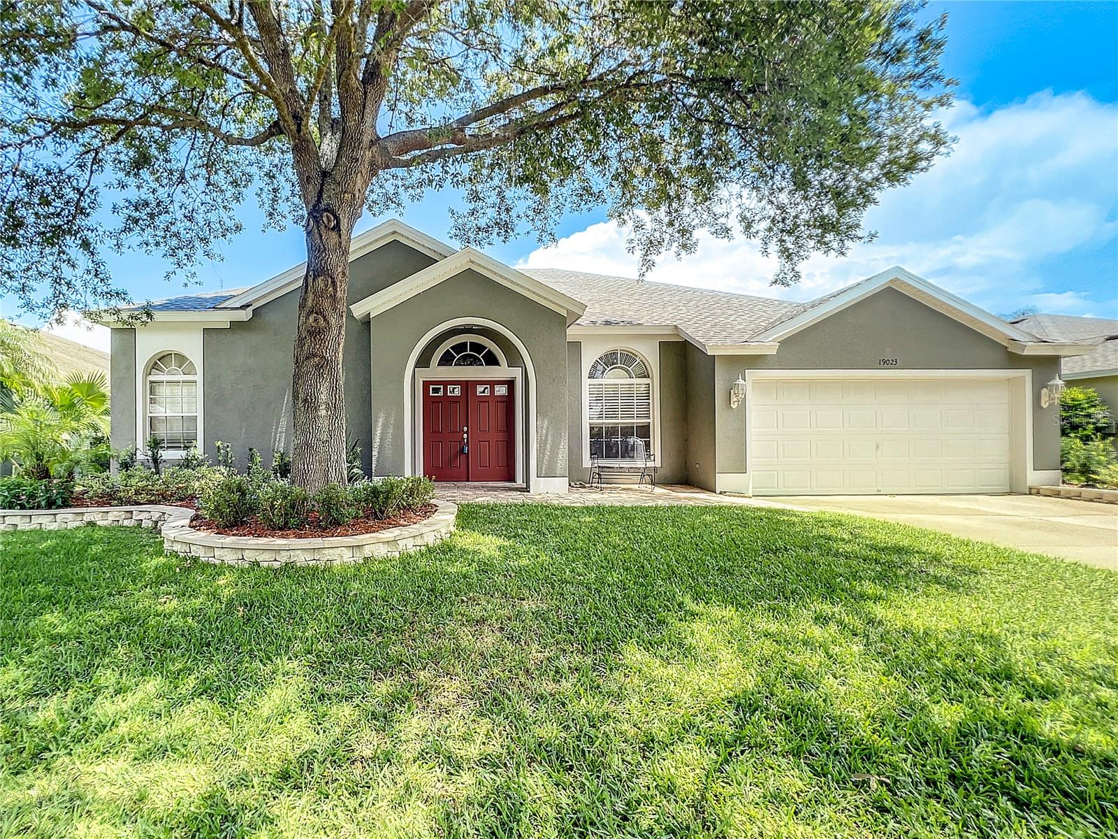 Move in ready single family block home with 4 bedrooms / 3 full baths / Office and attached 2 car garage built on premium pond lot in gated community of Fern Glen. Built in 2003 with 2565 heated SF. New roof 2020. New hot water heater 2021. New pool heater 2022.
AC in good condition 11 years old. Interior layout includes separate living and dining rooms with crown molding. Kitchen and family room combination. Kitchen includes all existing appliances and Corian counters. New carpet in all bedrooms and fresh interior neutral paint. Primary bedroom with pond views and his and hers closets. Large master bath includes garden tub and separate shower and split dual vanities. Exterior highlights include screen enclosed inground pool and spa with spacious brick paver lanai overlooking pond setting. Tropical landscaping includes custom raised landscaping beds. Home also includes upgraded Culligan water system. Close to Suncoast Expressway access ramp, Suncoast Trail, dining, Super Walmart, Target and more. Walking distance to North Star Equestrian Farm, TPC Tampa Golf, Daycare/Pre-school, Lutz Montessori and all A-rated 3 school campus (McKitrick Elementary, Martinez Middle & Steinbrenner HS).