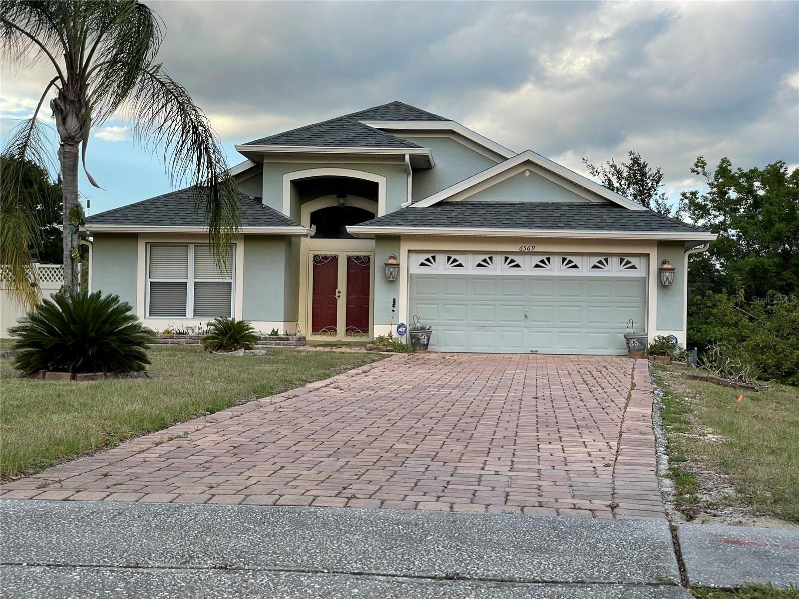 Beautiful Water-view house. Conveniences location, good neighborhood, 3 beds and 2 baths large living and dining room, Open space from kitchen you can see the family room. Overlooking the deck and the Lake...great with a cup of coffee and teas start of a new day with beautiful peaceful view over look beautiful Lake....Cozy screened in patio can convert to out door kitchen. 6 year old roof, 6 year old AC unit, updated kitchen and appliances, sprinkler system