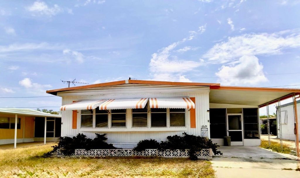 Photo of 6624 Durian Trail, New Port Richey, FL 34653 (MLS # W7883243)