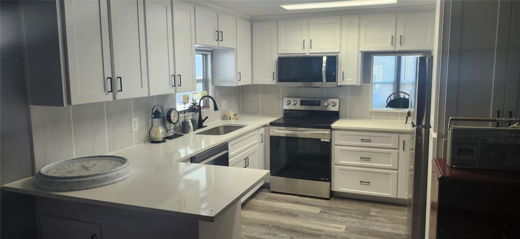 Photo of 3702 Tiki Drive, Holiday, FL 34691 (MLS # W7878267)