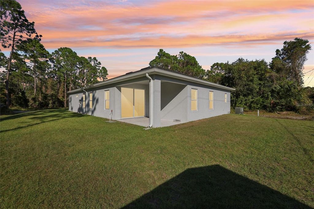 Photo of 430 Ward Road SW, Palm Bay, FL 32908 (MLS # O6364544)