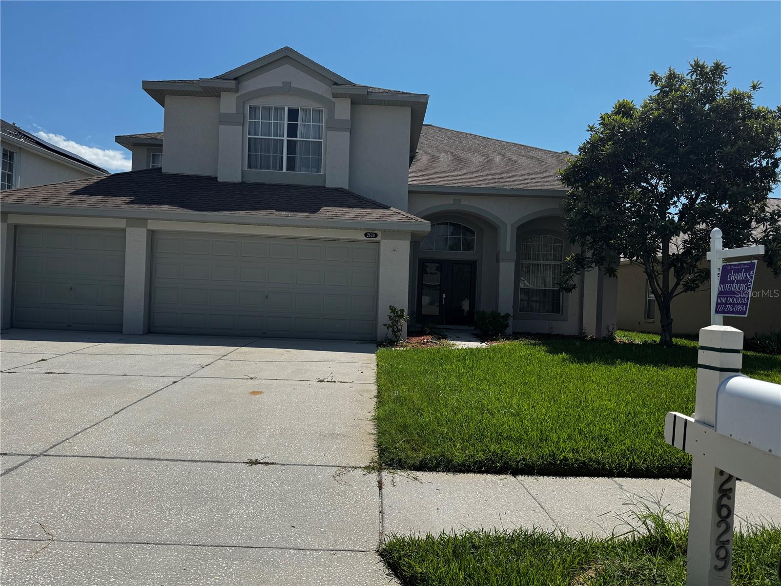 Stunning 5-bedroom, 3-bathroom residence with a bonus room! This home can be sold furnished if preferred. The exterior has recently been refreshed with a new coat of paint. A new roof and AC to be installed prior to closing. The main level features a guest bedroom and a full bathroom, along with formal dining and living spaces enhanced by beautiful hardwood flooring. The kitchen, designed with tiled flooring, includes a sink that overlooks the picturesque outdoor views. It is equipped with a built-in desk, stainless steel appliances, a spacious pantry, granite countertops, a stylish backsplash, a large undermount sink, a breakfast bar, recessed lighting, and glass sliding doors that lead to a vast screened patio complete with an outdoor kitchen and grill, ensuring privacy as it backs onto lush greenery. The expansive family room also features additional glass sliding doors to the patio and plenty of windows for natural light. Upstairs, you’ll discover four more bedrooms, including a luxurious master suite with California closets. The master bathroom offers a soothing garden tub, a separate shower, and a dual-sink vanity. The sizable bonus room showcases beautiful built-in cabinetry. Conveniently located just minutes from Howard Park Beach and a short drive to Honeymoon Island State Park and Caladesi Island—regularly ranked among America’s “Top 10 Beaches”! Key Vista is a family-friendly gated community surrounded by serene nature parks, just moments from the Gulf of Mexico. It boasts a wide range of amenities, including a large heated pool, an open deck area, a hot tub, tennis courts, pickleball and volleyball courts, a playground, a clubhouse, a gym, and a recreational room, all with cable and internet included. This is a remarkable opportunity to own a coastal home in a prime location, with easy access to the Anclote Bike Trail, Anclote Park (featuring a fishing pier and boat ramp), Key Vista Nature Park, Anclote Gulf Park (which includes a dog park), and Anclote River Park (offering beach access and public facilities). Additionally, furniture is available for purchase. Don’t miss out on this fantastic opportunity!