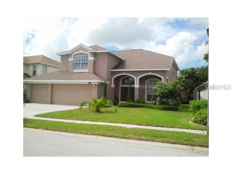 BEAUTIFUL 5-Bedroom, 3-Bathroom Home with Bonus Room and 3 car garage! No Flood Insurance Needed! Stunning residence is available with the option to be sold furnished for your convenience. The exterior has recently been revitalized with a fresh coat of paint, and a brand-new air conditioning system will be installed before closing with acceptable offer the other ac is relatively new. Step inside to discover a welcoming main level that includes a guest bedroom and a full bathroom, along with elegant formal dining and living areas adorned with gorgeous hardwood flooring. The kitchen is designed for both functionality and style, featuring tiled flooring, a large sink with scenic outdoor views, a built-in desk, stainless steel appliances, a generous pantry, granite countertops, backsplash, a spacious breakfast bar, and recessed lighting. Glass sliding doors open to an expansive screened patio, complete with an outdoor kitchen and grill, offering a serene retreat that backs onto lush greenery for added privacy. The bright and airy family room also boasts glass sliding doors to the patio, allowing for an abundance of natural light. Upstairs, you will find four additional bedrooms, including a luxurious master suite equipped with California closets. The master bathroom is a personal oasis, featuring a relaxing garden tub, a separate shower, and a dual-sink vanity. The sizable bonus room is enhanced with beautiful built-in cabinetry, perfect for your needs.Located just minutes from Howard Park Beach and a short drive to Honeymoon Island State Park and Caladesi Island—consistently ranked among America’s “Top 10 Beaches”! Key Vista is a family-friendly, gated community enveloped by peaceful nature parks and mere moments from the Gulf of Mexico. The community offers a wealth of amenities, including a large heated pool, a sun deck, a hot tub, tennis courts, pickleball and volleyball courts, a playground, clubhouse, gym, and recreational room—all with cable and internet included. This is a unique opportunity to own a coastal home in an ideal location, with easy access to the Anclote Bike Trail, Anclote Park (featuring a fishing pier and boat ramp), Key Vista Nature Park, Anclote Gulf Park (which includes a dog park), and Anclote River Park (offering beach access and public facilities). Furniture is also available for purchase. Don’t let this incredible opportunity slip away!
