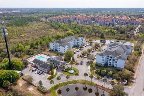 Photo of 3176 Feltrim Place #302, Kissimmee, FL 34747 (MLS # O6317347)