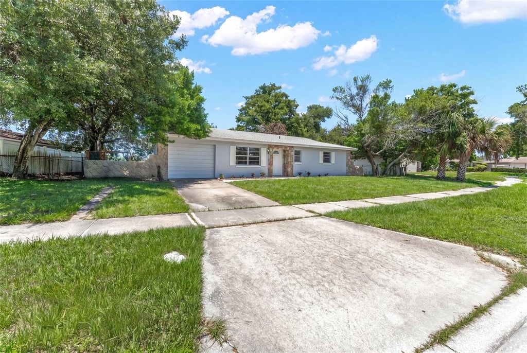 Photo of 1754 Foxboro Drive, Orlando, FL 32812 (MLS # O6419633)