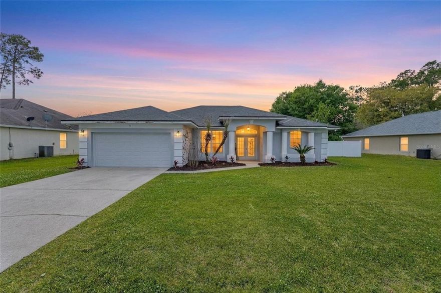 Tastefully renovated 3-bedroom, 2-bathroom concrete block home with a screened-in pool, offering the perfect blend of style and convenience. Nestled in the heart of Palm Coast with no HOA or CDD fees, this property is a rare find. The open-concept floor plan boasts vaulted ceilings and a seamless flow, ideal for modern living and entertaining. The fully renovated kitchen features solid wood shaker cabinets, quartz countertops, brand-new stainless steel appliances, and a stylish glass tile backsplash. Enjoy peace of mind with a brand-new roof and AC, as well as fresh interior and exterior paint. The pool area has been revitalized with new plaster, pump, and lighting, creating a private oasis for relaxation and fun. Inside, the home is updated with new luxury vinyl plank flooring, modern plumbing fixtures, and lighting throughout. This home is a must see!