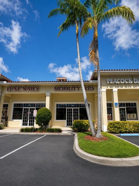 Photo of 270 NW Peacock Boulevard #104, St Lucie West, FL 34986 (MLS # O6425513)