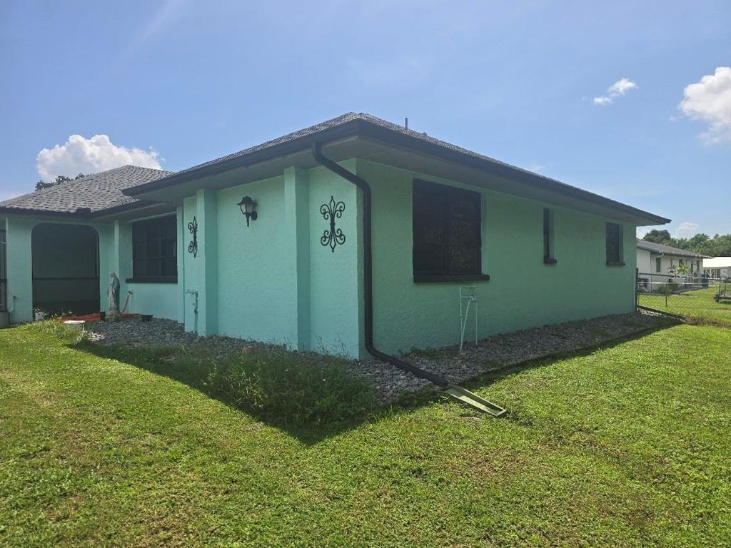 Photo of 22469 Aster Avenue, Port Charlotte, FL 33980 (MLS # A4706652)