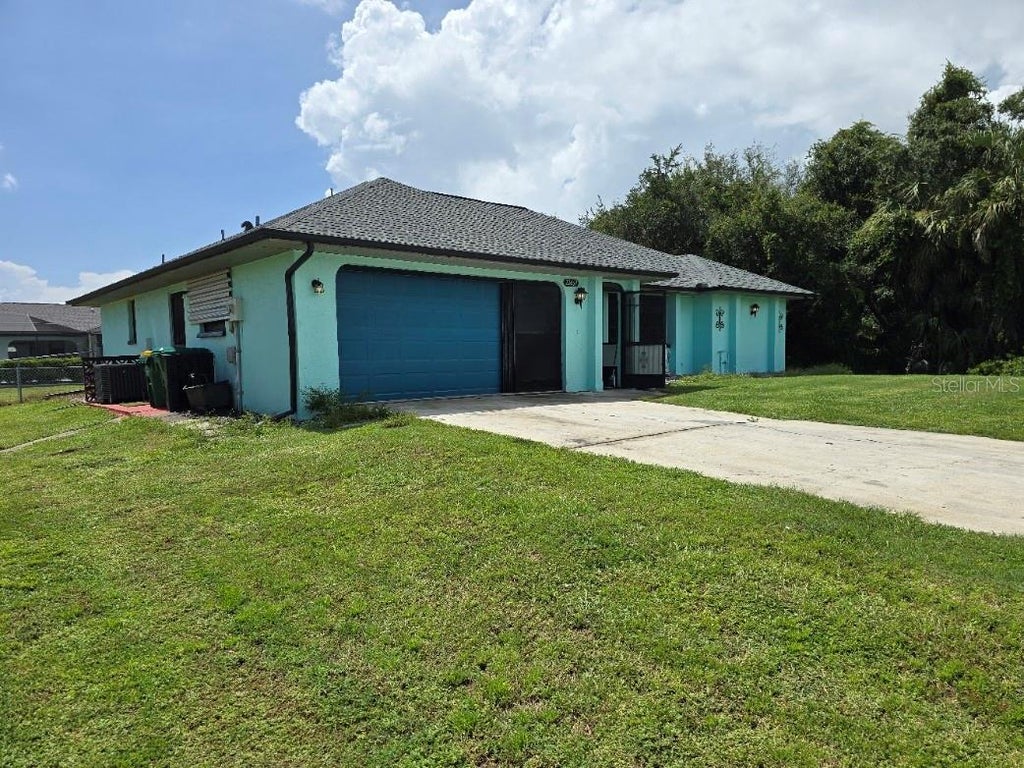 Photo of 22469 Aster Avenue, Port Charlotte, FL 33980 (MLS # A4706652)