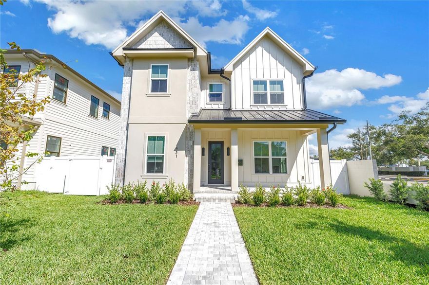 100% Completed and Move-in-Ready!  Presenting the Coastal Oasis by the Highly Acclaimed Bay to Bay Group in the Greater Allendale Neighborhood of Five Points! This Single Family Home with Detached Accessory Dwelling Unit Has Been Meticulously Curated by Bay to Bay's In House Design Team, and Offers a Contemporary New Construction Residence for the Most Discerning Buyer. The Main Home Includes 2,616 Living SF Divided Amongst Foure (4) Bedrooms + 2nd Level Family Room, Three and One-Half (3.5) Bathrooms, Electric Fireplace, Dry Bar and Spacious Master Suite with Large Walk-In Shower and Free-Standing Tub. The Detached, Accessory Dwelling Unit (ADU) Rests Above a Two (2) Car Garage and Offers 470 Living SF, a Dedicated Bedroom & Bathroom and a Separate Closet for a Washer/Dryer. The Coastal Oasis has a Beautiful Exterior Aesthetic Which Includes a Hardie Plank Siding, Brick Facade and a Charming Covered Front Porch. 10' Ceilings on the First & Second Levels of the Main Home (and the ADU) Make the Spaces Feel Open & Airy, and the Many Designer Details Give the Property a Warm Feel. Solid Concrete Slab Foundation, Icynene Attic Insulation, Engineered Hardwood Plank Flooring Throughout (except wet areas), 8' Tall Interior Doors, Impacted Rated Windows & Exterior Doors, Spacious Kitchen with Walk-in Pantry & Quartz Countertops, Premium Stainless Steel Appliances, High Efficiency Air Conditioning System with Heat Pump, White Vinyl Fencing, Roof Gutters, Numerous Trim & Casing Millwork Details Throughout, Spacious Laundry Room with Cabinetry & Laundry Sink, Landscaping with Irrigation System and So Much More! The Coastal Oasis Truly Has it All, and is Move-in-Ready! Located on a High & Dry, Flood Zone X Lot Just Minutes to Booming Downtown St Petersburg, Steps to 4th St N, the Barrier Islands and Tampa.