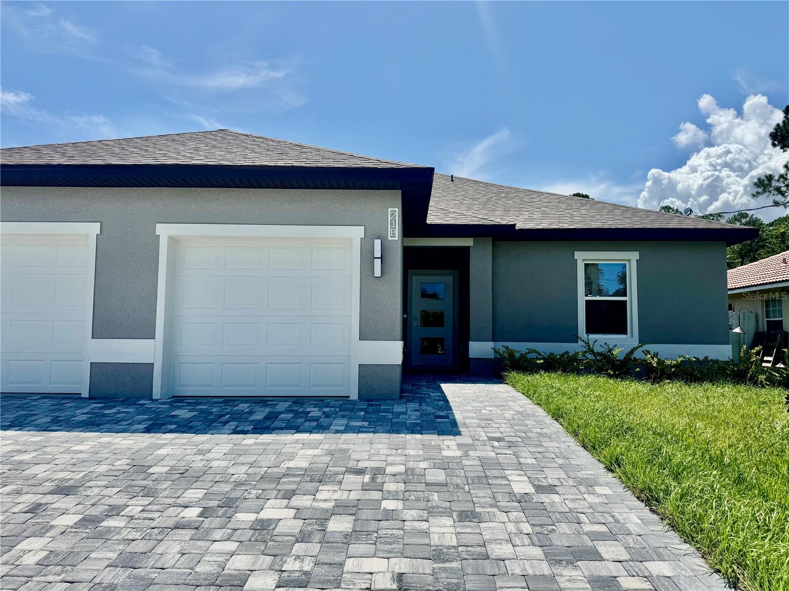 JUST BUILD Duplex for Rent in Prime Palm Harbor Location! This brand-new duplex is ready for you to call home! Featuring 3 spacious bedrooms, 2 full bathrooms, and a convenient 1-car garage, this home offers both comfort and style. The kitchen features stainless steel energy-efficient appliances, elegant granite countertops, and 42-inch cabinets. The master shower and guest bath are adorned with tile that extends all the way to the ceiling, adding a touch of sophistication to your daily routine. The house boasts waterproof, scratchproof luxury vinyl planks throughout, combining beauty and durability to withstand the test of time. Each bedroom is equipped with ceiling fans featuring built-in lighting. Located just minutes from shopping centers, schools, churches, and easy access to I-95, this home is ideal for anyone looking for convenience. You’re only 2 miles from the stunning Atlantic Ocean—perfect for beach days and coastal living!