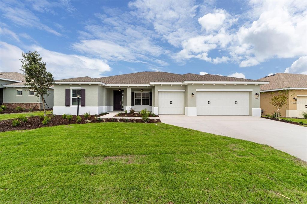 Photo of 10007 SW 106th Circle, Ocala, FL 34481 (MLS # OM712087)