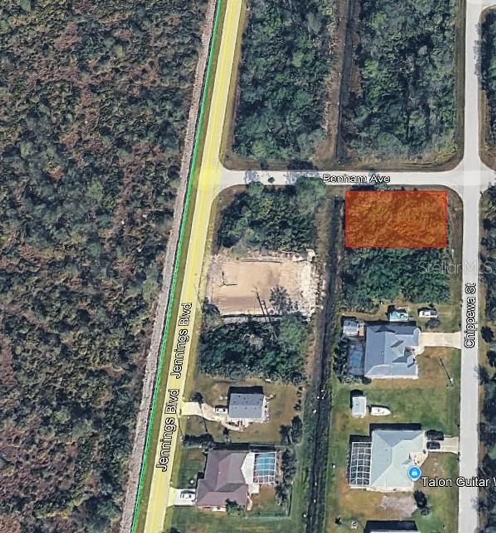 Photo of 12027 Benham Avenue, Port Charlotte, FL 33981 (MLS # D6146771)