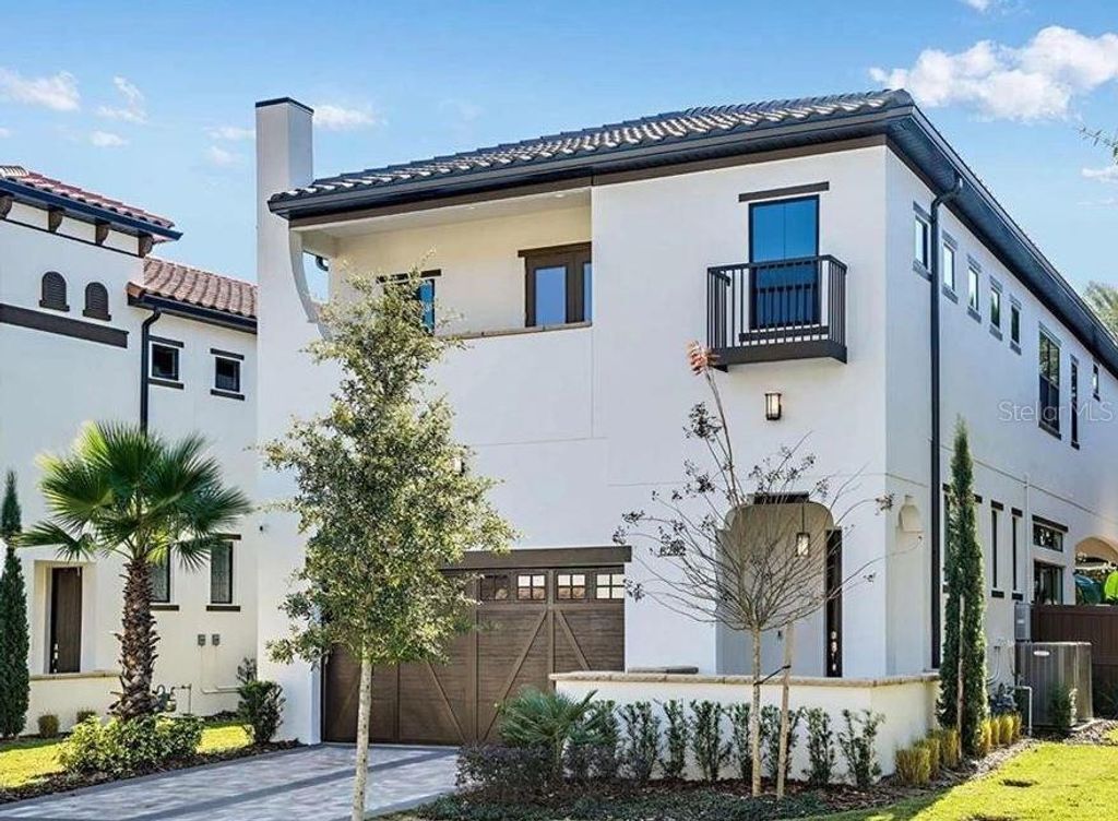 Photo of 8202 Via Vittoria Way, Orlando, FL 32819 (MLS # O6386630)