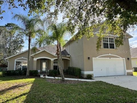Photo of 38 Canterbury Woods, Ormond Beach, FL 32174 (MLS # V4945663)