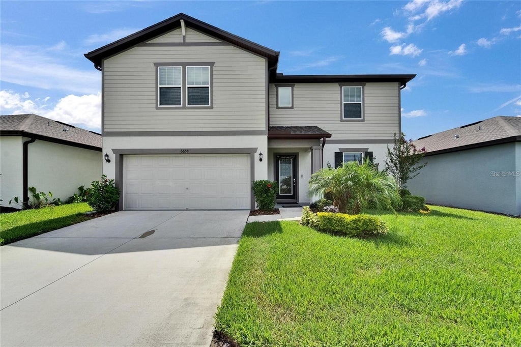 Photo of 6658 Devlin Lane, Wesley Chapel, FL 33545 (MLS # TB8555339)