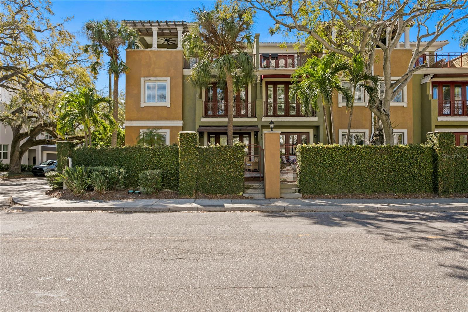 This exquisite, one-of-a kind 3 story villa home features 4 bedrooms, 3.5 bathrooms, elevator and spans over 3000 sq ft. This beautiful luxury home is located in exclusive Asbury Park gated community on Tampa Bay's Iconic Bayshore Boulevard. The townhome is spacious and upscale with views of Hillsborough Bay where your guest will delight in the tranquil Backyard Oasis. Large Open-Air Third floor Rooftop Patio.
The master bedroom offers a balconly with with french doors overlooking Bayshore Blvd. The home has three spacious floors with high ceilings, floor to ceiling windows, travertine floors and exotic Peruvian hardwood on stairs, hallways second and third floors. Upgraded granite in stainless steel kitchen and all baths. Bayshore Blvd is great for easy walks and runs along the water, and a playground nearby. Great Restaurants nearby and popular River Walk in downtown Tampa.