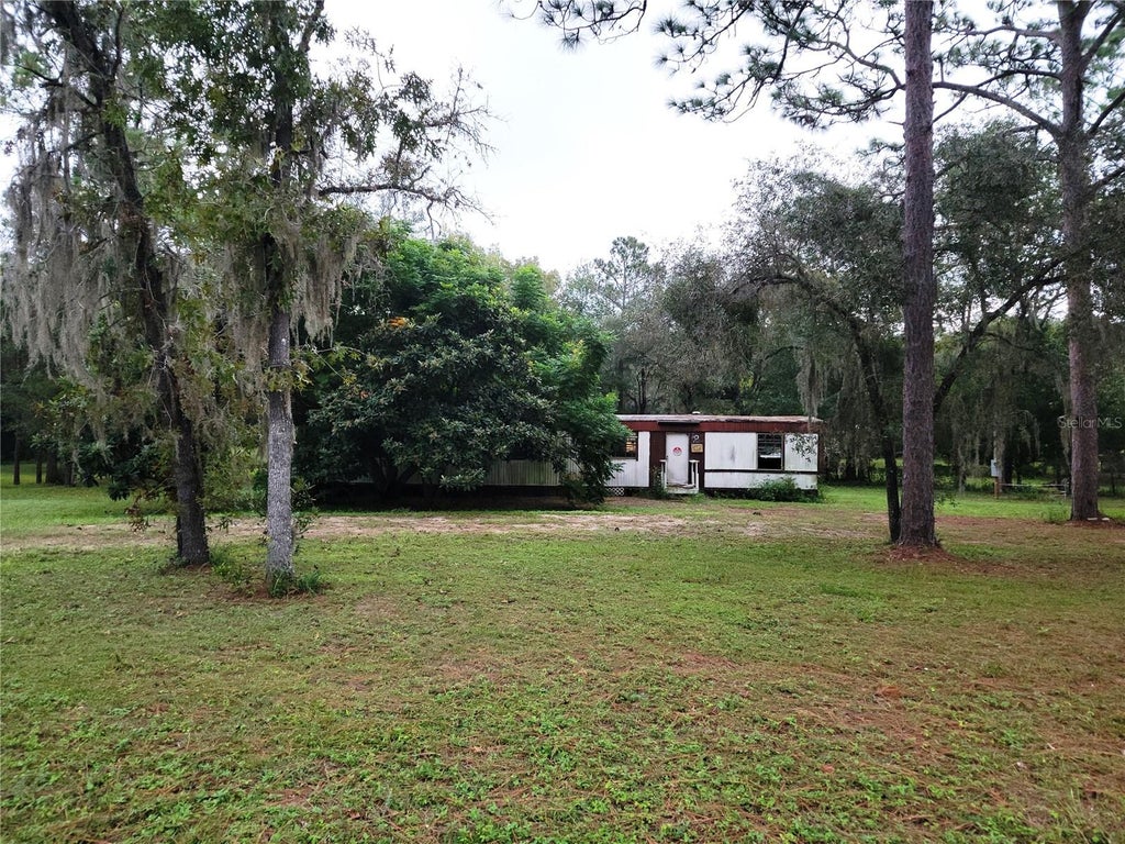 Photo of 12231 NE 64 Place, Williston, FL 32696 (MLS # OM733597)