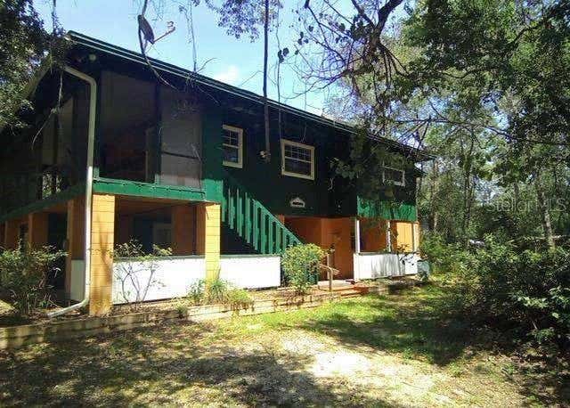Photo of 3339 E Withlacoochee Trail, Dunnellon, FL 34434 (MLS # O6435598)