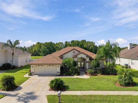 Photo of 1301 Fox Chapel Drive, Lutz, FL 33549 (MLS # TB8548922)