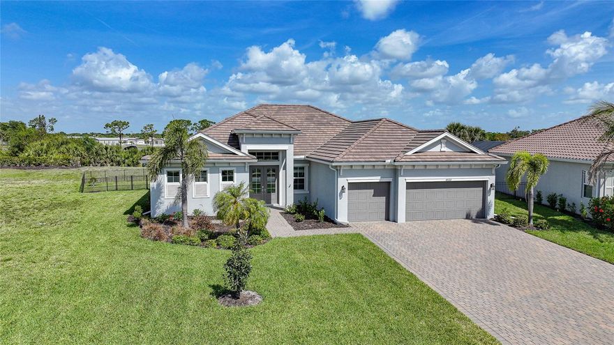 LIVE THE ULTIMATE FLORIDA WATERFRONT LIFESTYLE. PERFECTLY POSITIONED ON NEARLY HALF AN ACRE WITH 165 FEET OF WATER FRONTAGE, THIS HOME OFFERS LUXURY, SPACE, AND SERENE VIEWS YOU WON’T FIND ANYWHERE ELSE.

Welcome to this beautifully maintained 3 BEDROOM + DEN, 3 BATHROOM, 3 CAR GARAGE POOL & SPA home located in the QUIET, HIGHLY DESIRABLE waterfront community of Harbor West in Port Charlotte. Situated on an expansive .48 ACRE LOT, this property delivers a rare combination of privacy, functionality, and upscale Florida living.

From the moment you arrive, you’ll notice the thoughtful upgrades and pride of ownership throughout, including a NEW 2026 ROOF WITH A 7-YEAR TRANSFERABLE WARRANTY, HURRICANE PROTECTION WITH IMPACT WINDOWS AND SLIDING DOORS for added peace of mind, and a NEW POOL CAGE (2023). The adjacent lot to the left is NON-BUILDABLE, creating an added buffer of privacy that is nearly impossible to find.

Step inside to discover HIGH CEILINGS, an OPEN, AIRY FLOOR PLAN, and generously sized living spaces designed for both everyday comfort and ENTERTAINING. The OVERSIZED BEDROOMS AND BATHROOMS offer abundant closet space, while the flexible DEN provides the perfect space for a home office, gym, or guest retreat.

At the heart of the home is a SPACIOUS OPEN KITCHEN built for gathering—featuring ample counter space and seamless flow into the main living and dining areas, making hosting effortless.

Step outside to your private oasis where indoor and outdoor living blend seamlessly. Enjoy your SCREENED-IN POOL AND SPA, overlooking 165 FEET OF WATERFRONT, with plenty of space to relax, entertain, or simply take in the peaceful surroundings. The FENCED-IN YARD is ideal for pets, while the oversized lot provides room to spread out and truly enjoy the Florida lifestyle.

With a 3-CAR GARAGE, expansive lot, FULL HURRICANE PROTECTION, unmatched privacy, and premier waterfront setting, this home checks every box for those seeking space, luxury, and tranquility.

This is more than just a home—it’s a LIFESTYLE.