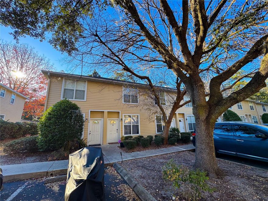 Move-in ready 2 bed/2.5 bath condo close to UF Campus, UF Health Shands Hospital, restaurants, and shopping! Laminate wood flooring runs throughout the living room, dining area, and bedrooms - NO CARPET! The downstairs layout features a spacious living room, kitchen, laundry closet, dining area, and a convenient half bathroom for guests. Upstairs, both bedrooms include their own bathroom, creating a functional and well-designed floor plan. Internet is included in the association fee. The community offers a pool and there is a covered bus stop outside the entrance with bus service to the University of Florida and UF Health Shands Hospital, adding to the everyday convenience of the location!