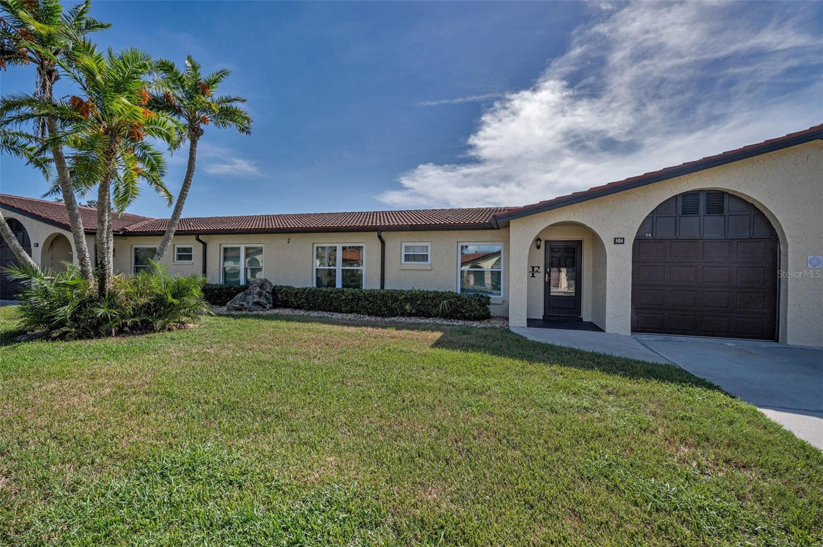 Welcome to this beautifully maintained 2-bedroom, 2-bath villa located in the highly sought-after 55+ community of Villas Capri! This charming single-story unit offers the perfect blend of comfort and convenience with an open and airy floor plan, abundant natural light, and tasteful updates throughout. Enjoy relaxing or entertaining in the spacious Florida room, ideal as a second living area, home office, or hobby space. The kitchen features granite countertops, stainless steel appliances, and a pass-through window for easy dining access. Tile flooring throughout ensures low-maintenance living, and the unit comes complete with an in-unit laundry area, attached garage, and plenty of storage. The community is quiet, well-kept, and located just minutes from Gulf beaches, shopping, dining, and medical facilities. HOA includes: cable, water, sewer, trash, exterior maintenance, and community amenities. Enjoy stress-free Florida living in this peaceful and friendly 55+ neighborhood. Don't miss your chance to own a slice of paradise—schedule your showing today!