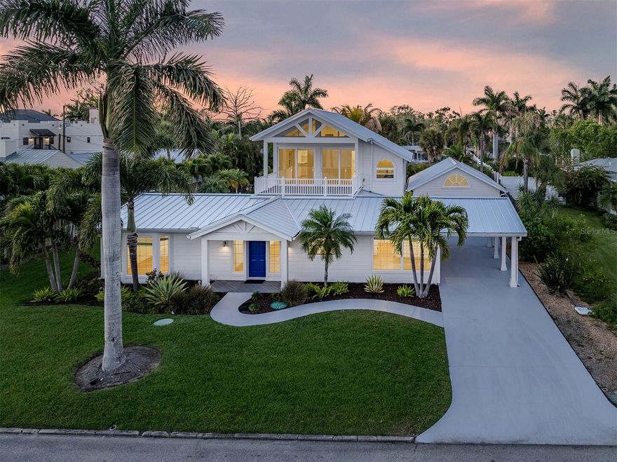 One or more photo(s) has been virtually staged. A boater’s paradise, this beautiful, fully renovated waterfront home offers the ultimate Florida lifestyle on the stunning waters of Roberts Bay. Designed for those who love life on the water, the expansive deep-water dock is fully equipped with water and electricity, along with two boat lifts (10,000 pounds and 4,500 pounds) ready to accommodate all your watercraft and toys, making every day an adventure. Inside, the home has been thoughtfully and completely updated with hurricane-impact windows and doors, and a new metal roof providing peace of mind and modern elegance. The new kitchen is a showstopper, featuring wood cabinetry, stainless steel appliances, sleek quartz countertops, abundant prep space, a charming coffee bar and space in the kitchen for casual dining, ideal for entertaining or enjoying quiet mornings at home. Natural light pours through large windows, creating a bright, airy atmosphere throughout. This well-designed three-bedroom, two-bath residence offers a spacious and private primary suite on the second floor, where you’ll wake up to breathtaking, panoramic views of Roberts Bay, an ever-changing waterfront backdrop that never gets old. You can enjoy your morning coffee and afternoon cocktail on your private upstairs balcony. Go outside in the backyard to your own private retreat, complete with a large open-air pool and spa, ideal for relaxing or hosting family and friends. The lush, landscaped yard features irrigation and ambient outdoor lighting, adding to the home’s inviting ambiance. Additional highlights include a two-car garage and a versatile air-conditioned cabana room, ideal for a home office, gym or guest space. Blending luxury, comfort and an unbeatable waterfront setting, this exceptional property is the place to call home. Conveniently located beaches, shopping and Legacy Trail. Proximity to downtown Venice Island restaurants!