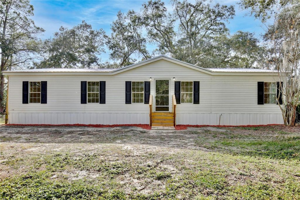 Photo of 15330 Apache Pass, Eustis, FL 32726 (MLS # OM714407)