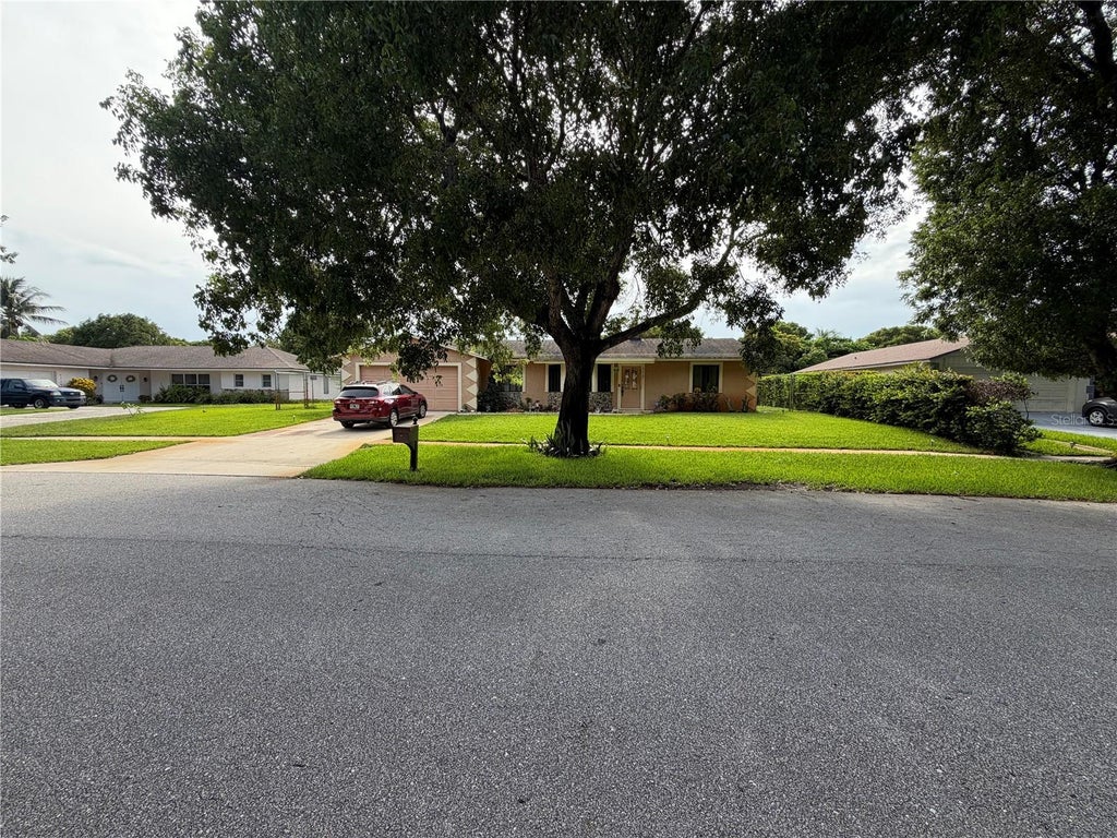 Photo of 4215 Latona Avenue, West Palm Beach, FL 33407 (MLS # TB8523619)