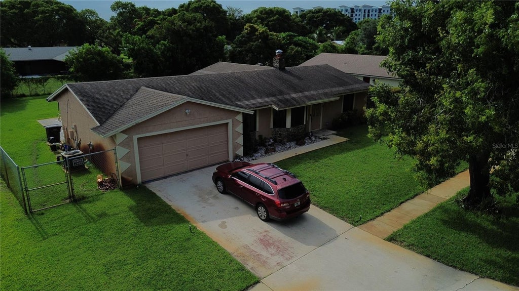 Photo of 4215 Latona Avenue, West Palm Beach, FL 33407 (MLS # TB8523619)