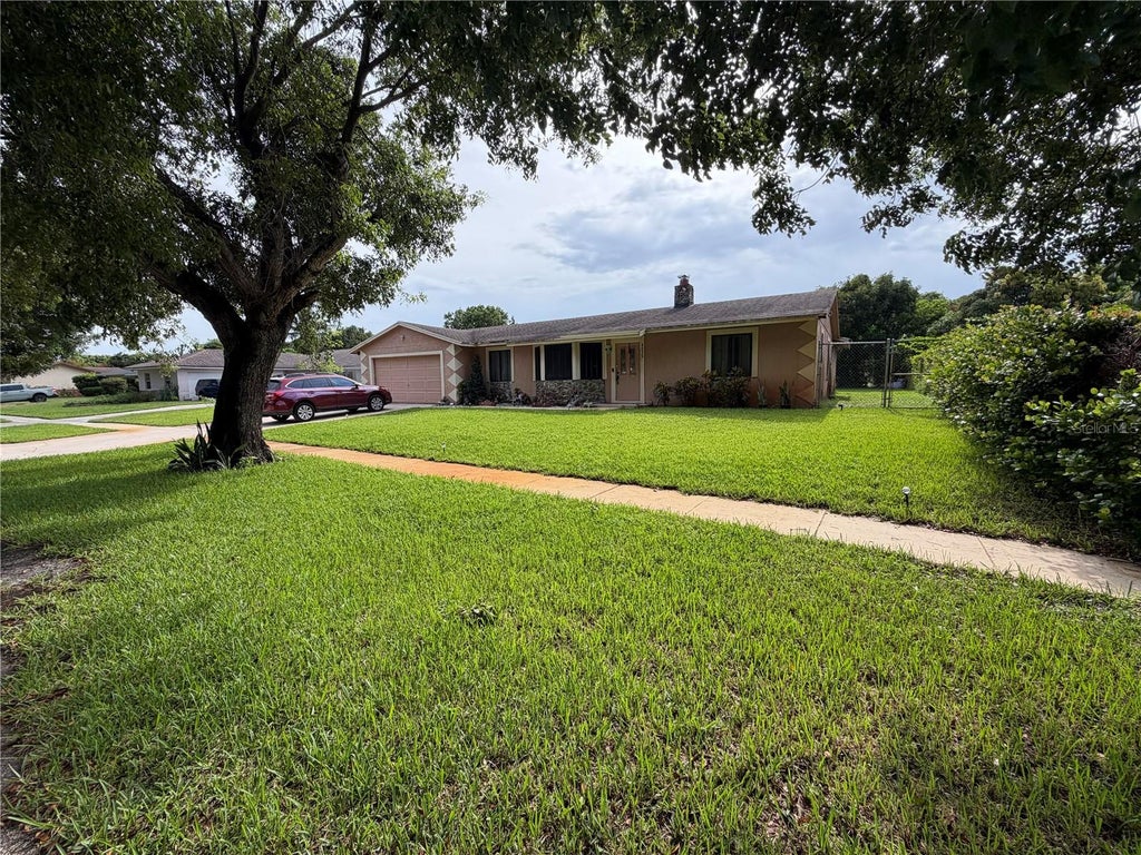 Photo of 4215 Latona Avenue, West Palm Beach, FL 33407 (MLS # TB8523619)