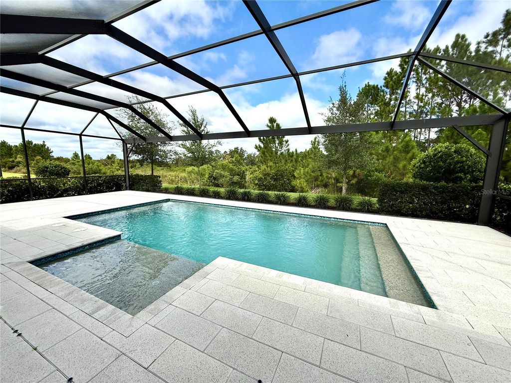 Photo of 33346 Castaway Loop, Wesley Chapel, FL 33543 (MLS # O6348692)